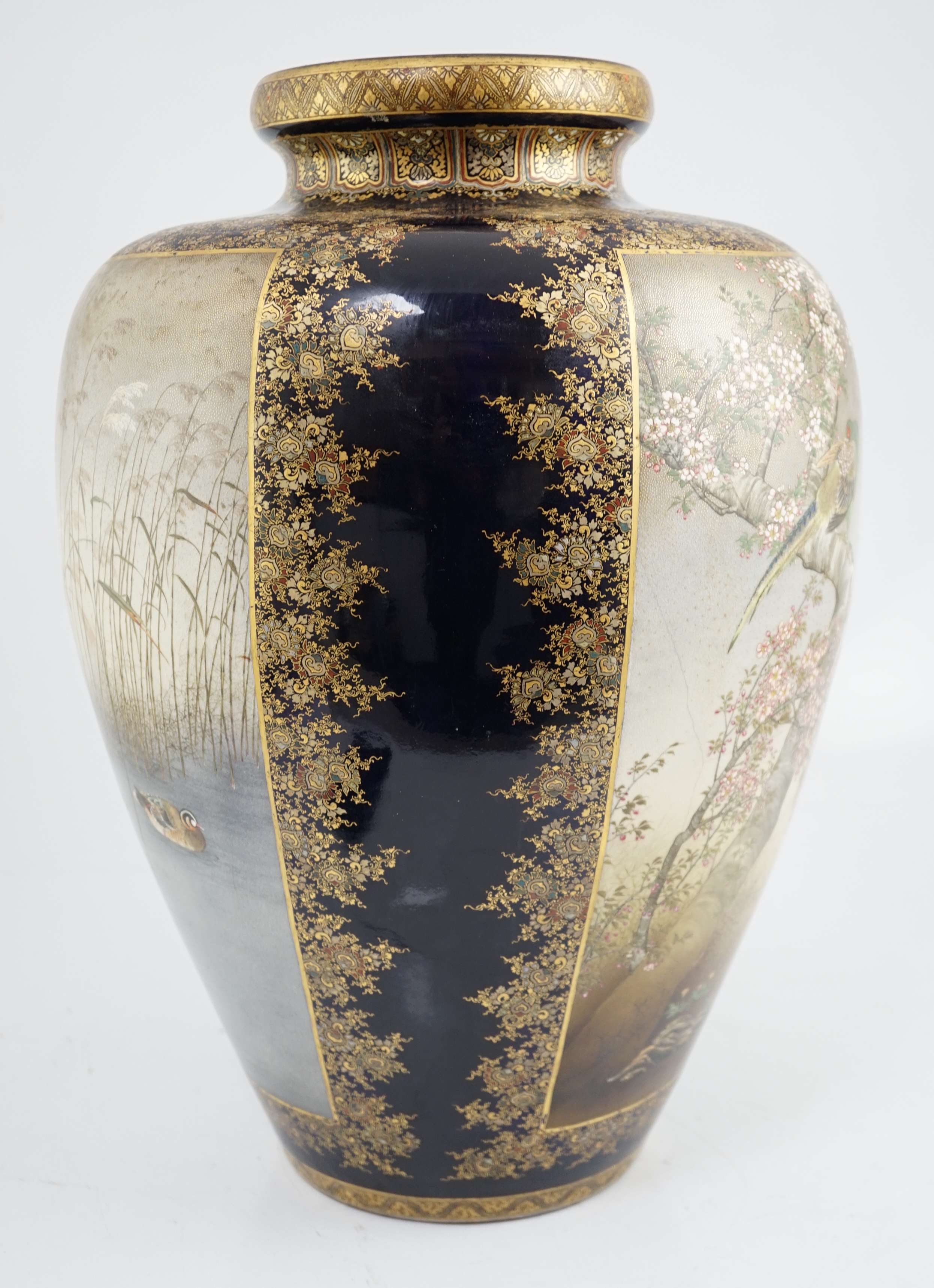 An exhibition size Japanese Satsuma pottery vase, by Kinkozan, Meiji period, star crack to one side